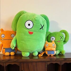 Vibrant Green and Orange Plush Monster Trio